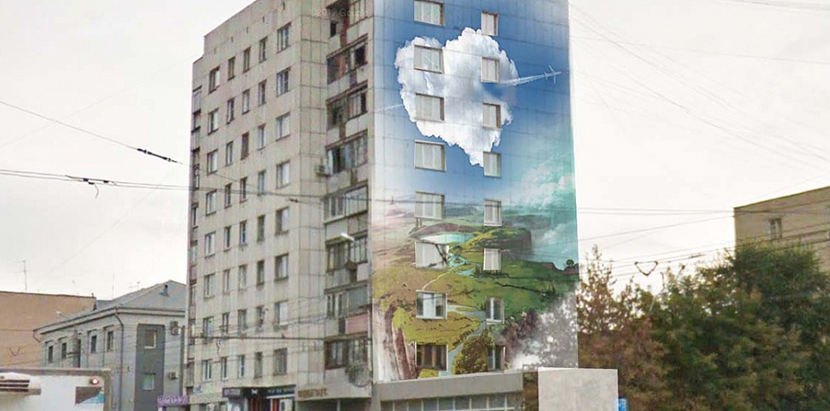 Мастера граффити нарисовали летящий самолет и спасенного котенка на фасадах Челябинска